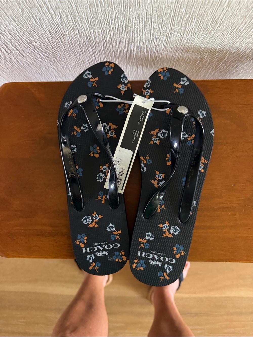 Coach Black Floral Jelly Flip Sandals with Orange & Blue Accents
